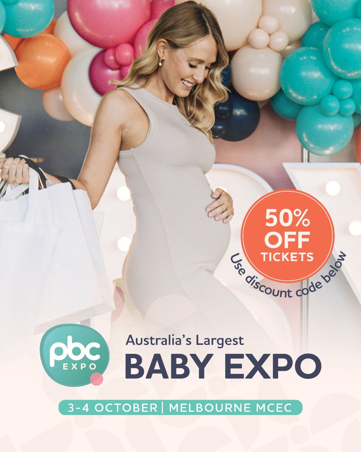 Pregnant woman celebrating at the PBC Baby Expo in Melbourne
